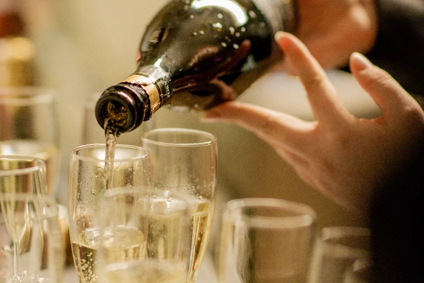 Champagne being poured at a celebration