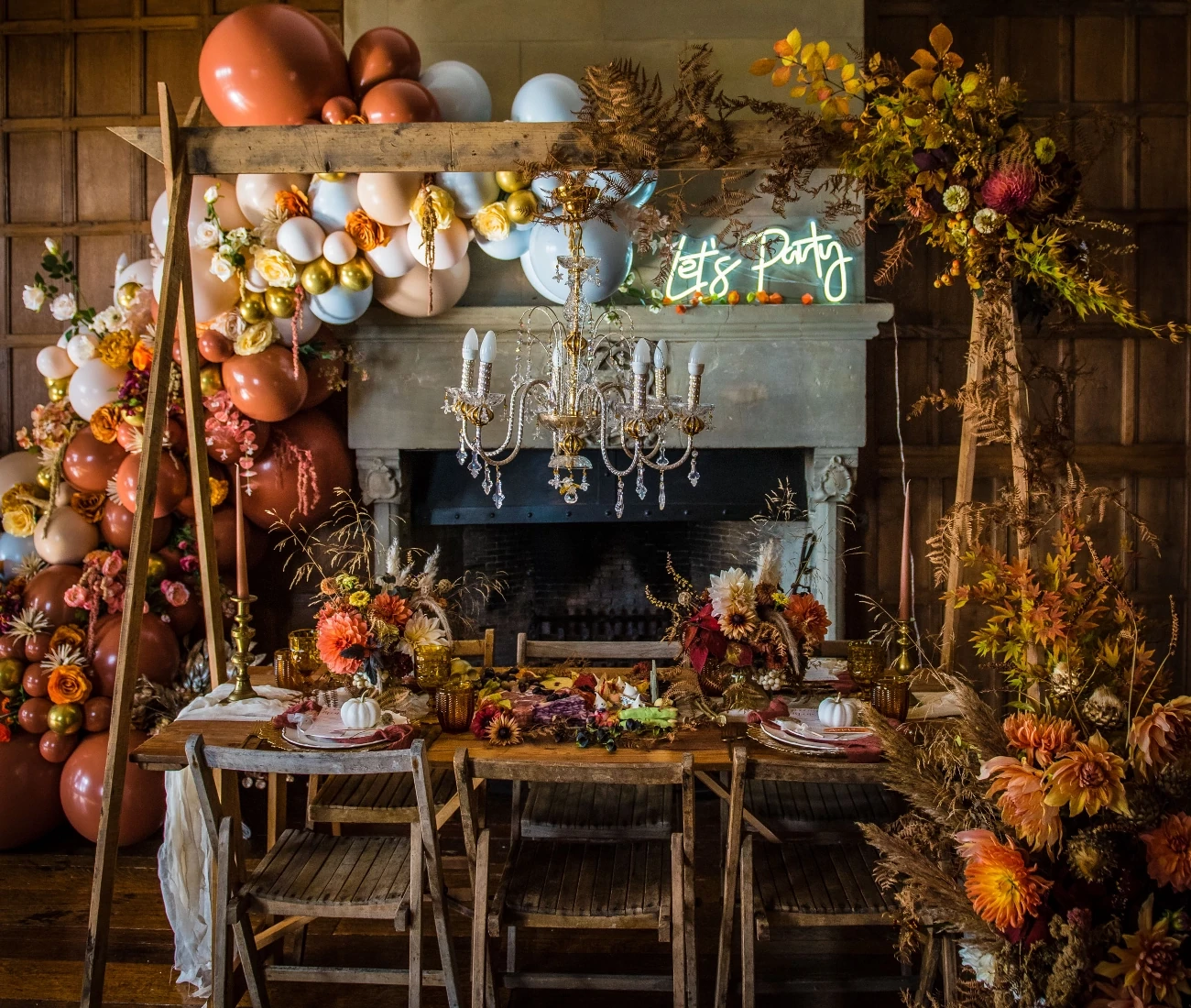 Autumn party table set with food and decorations in the west wing ceremony room